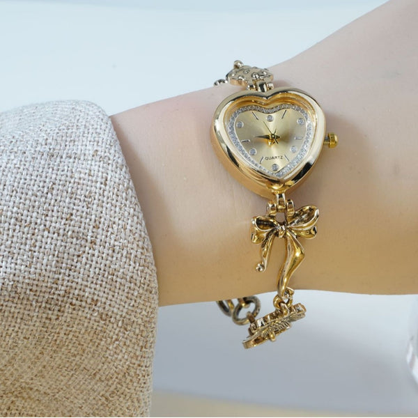 Retro Heart-shaped Bracelet Watch With A Golden Bow And Flow