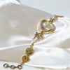 Retro Heart-shaped Bracelet Watch With A Golden Bow And Flow